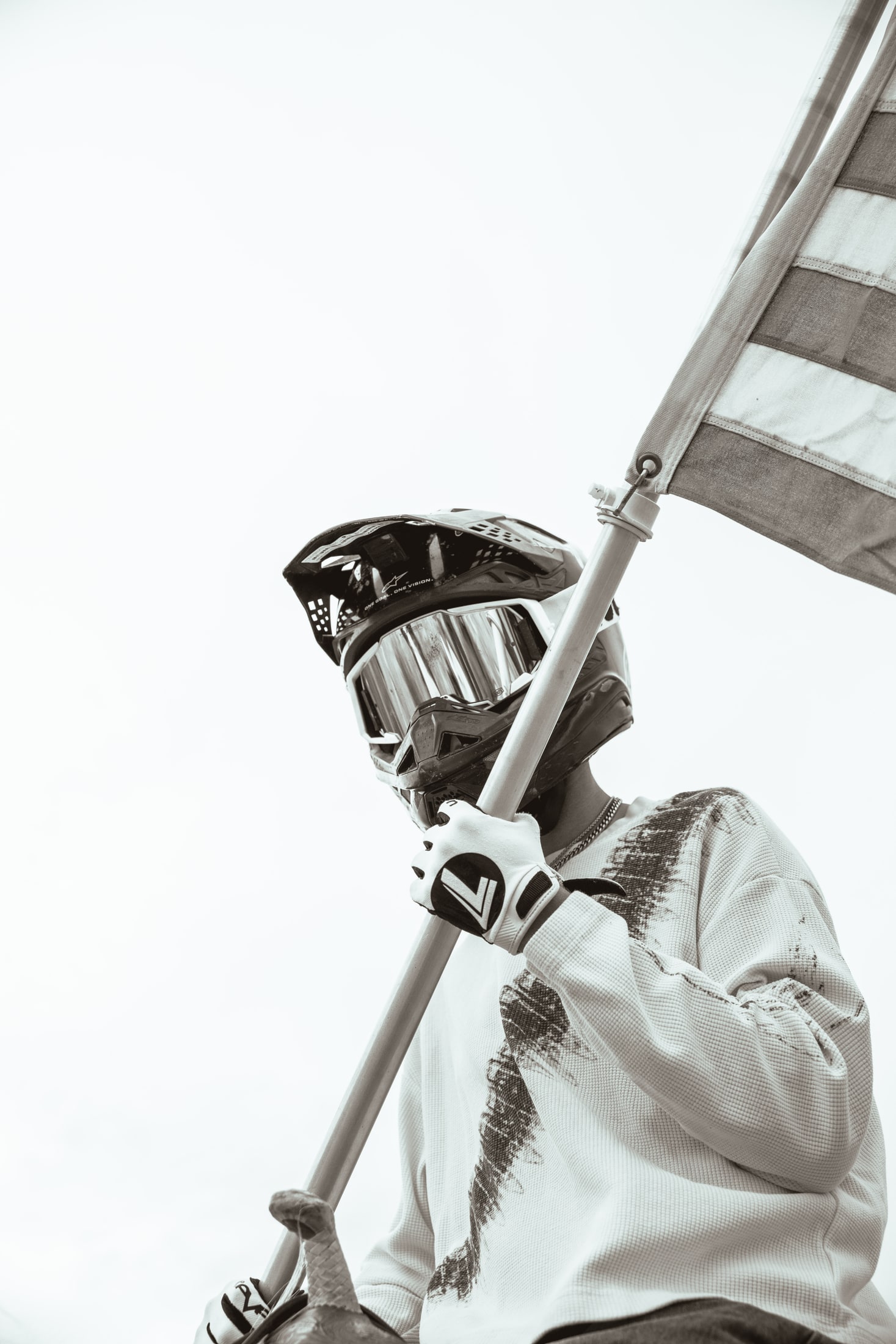 Motocross rider beside a railing